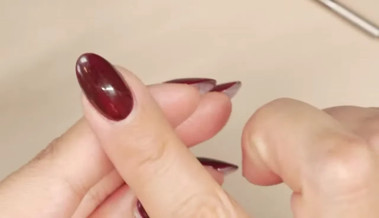 Detail of the sharp end of the professional cuticle pusher.