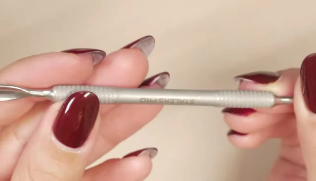 Close-up of the multi-purpose cuticle tool.