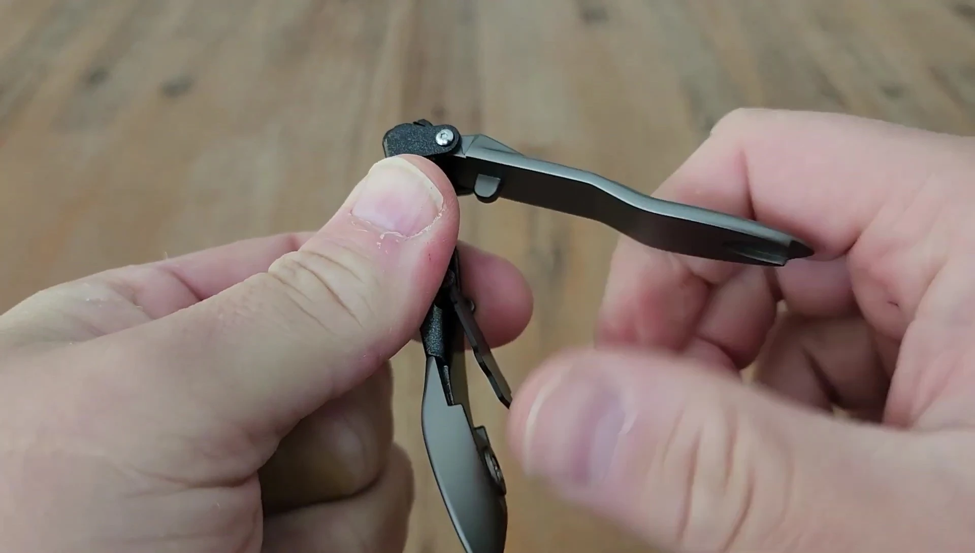Close-up of the clippers highlighting the metallic finish and sleek design.