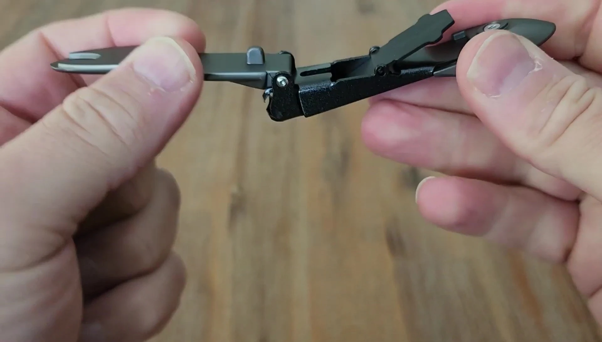 The clippers unfolded and ready for use, showcasing the cutting mechanism.