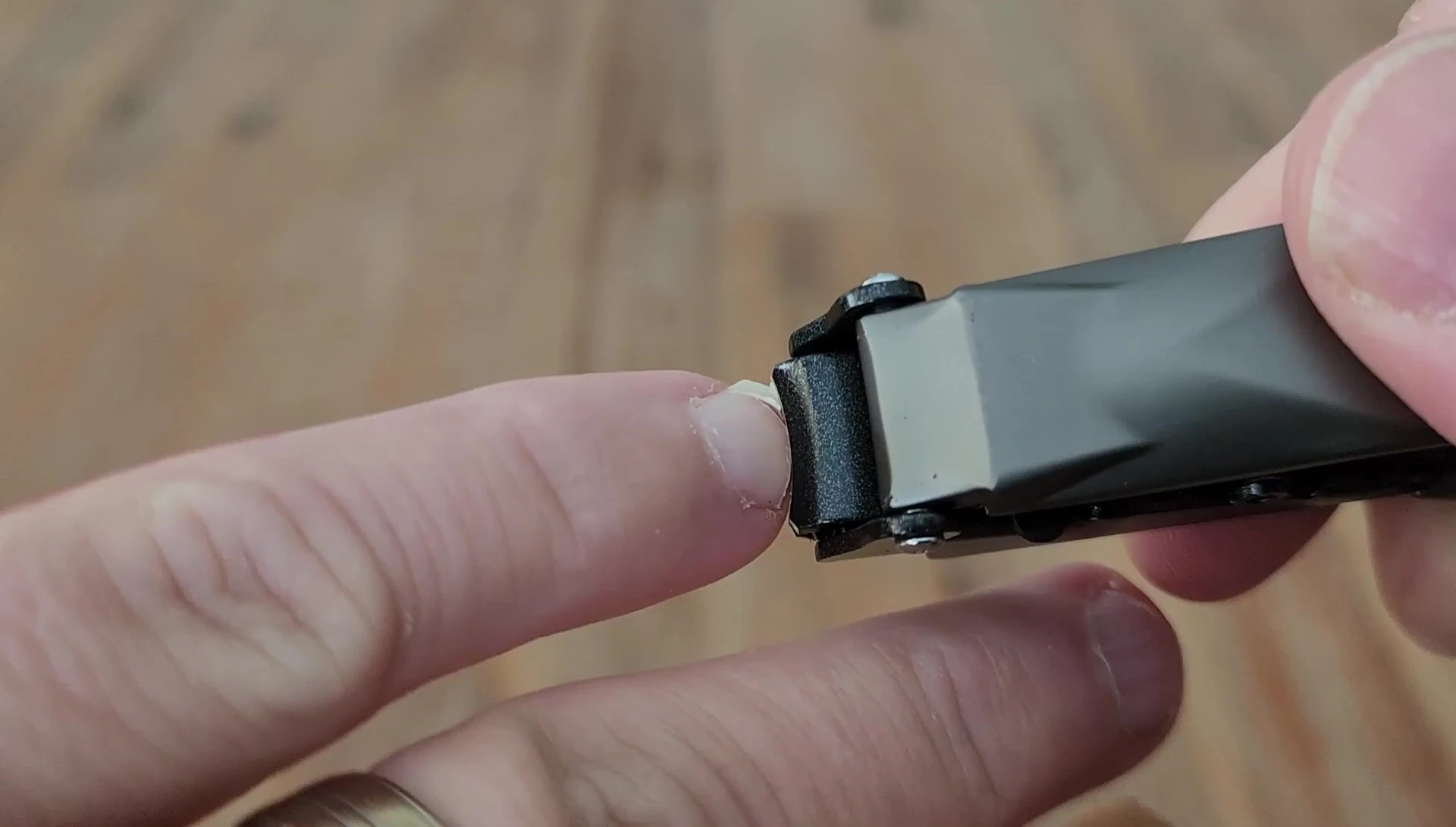 A close-up shot of the clippers in use, demonstrating the clean cut.