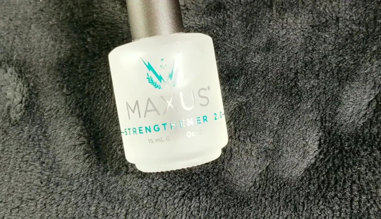 The reviewer showcasing their strong nails.