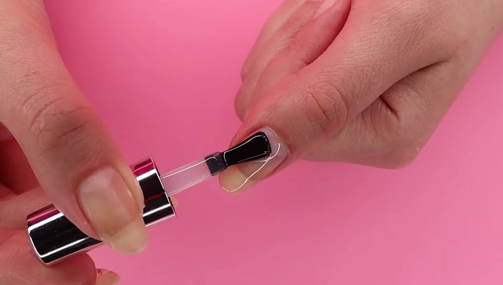 Applying a thin layer of gel base coat