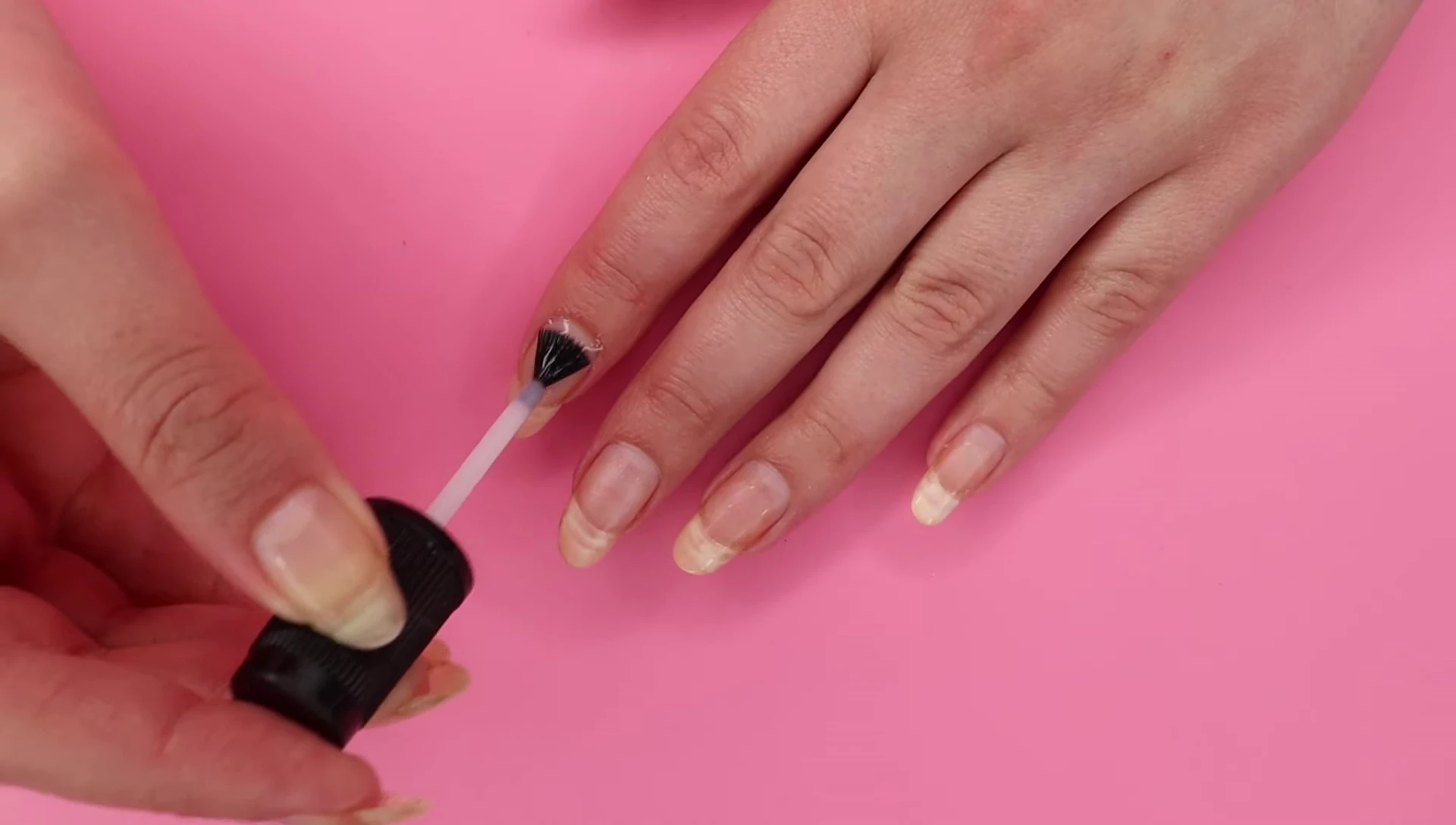 Using cuticle remover and pusher