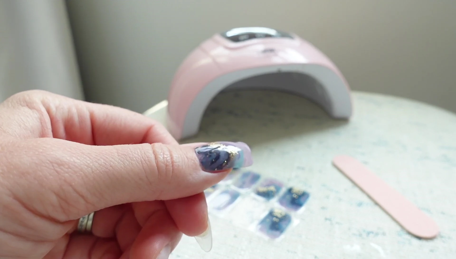The nails after the initial application of the stickers.