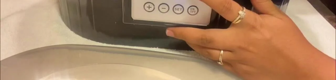 The digital display showing temperature settings