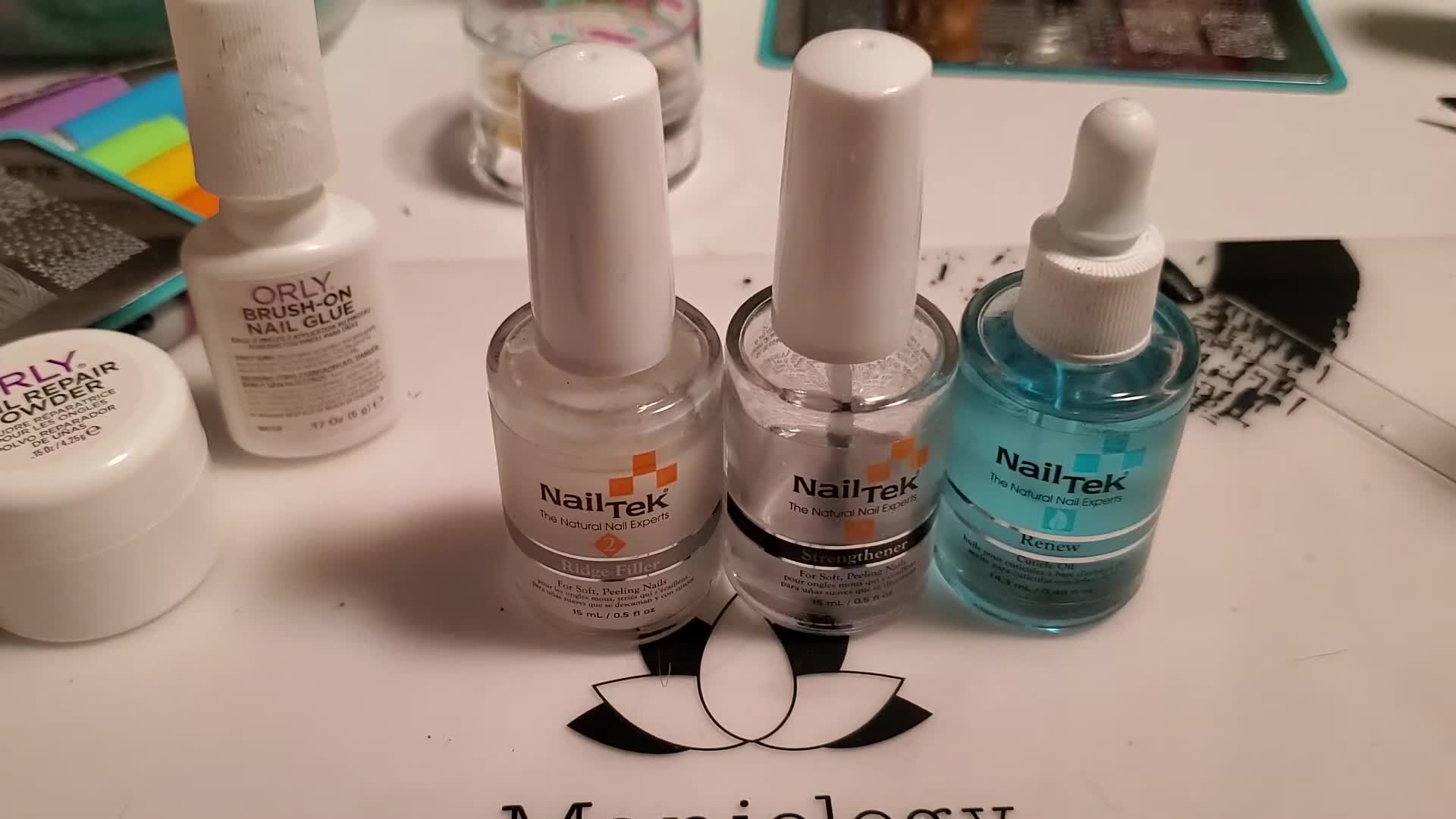 Close-up of brittle, flaky, and bendy nails before treatment.