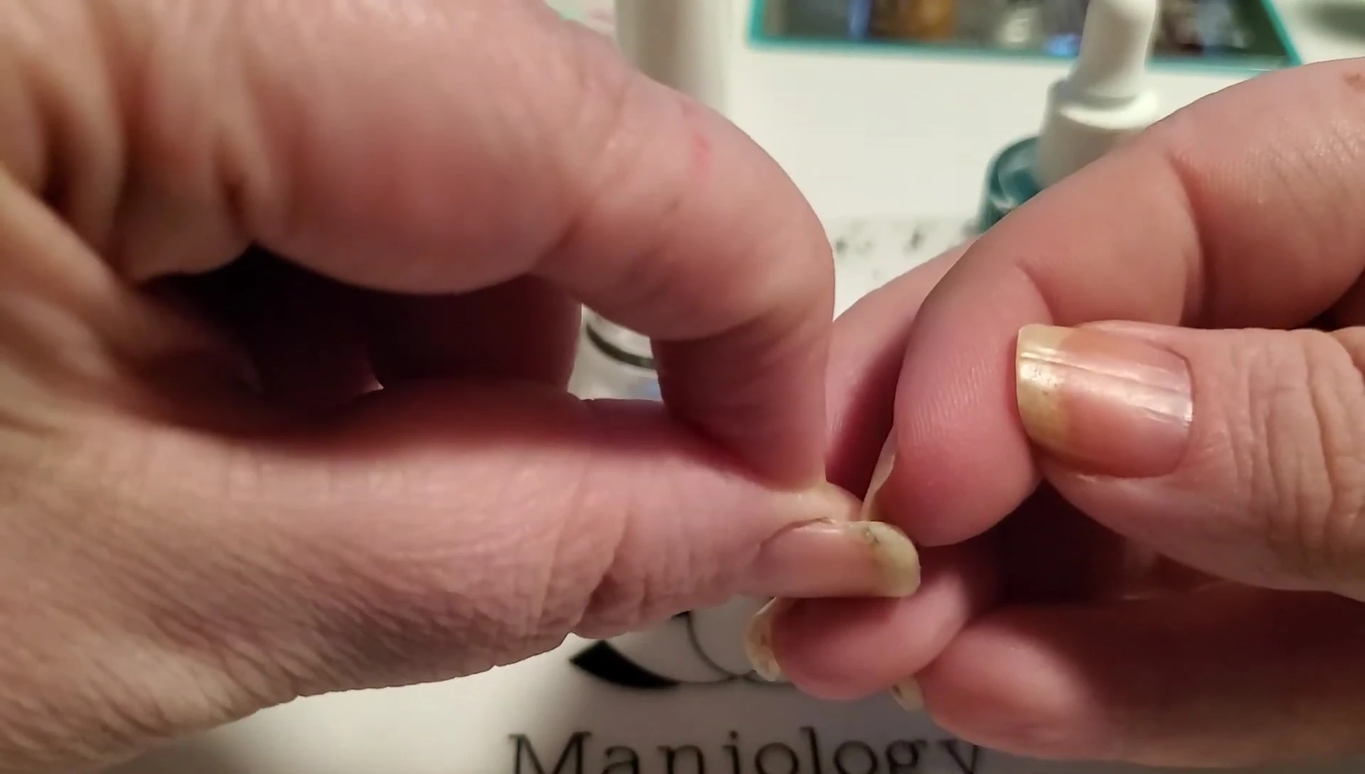 Example of a nail that's started to chip, showing the need for trimming.