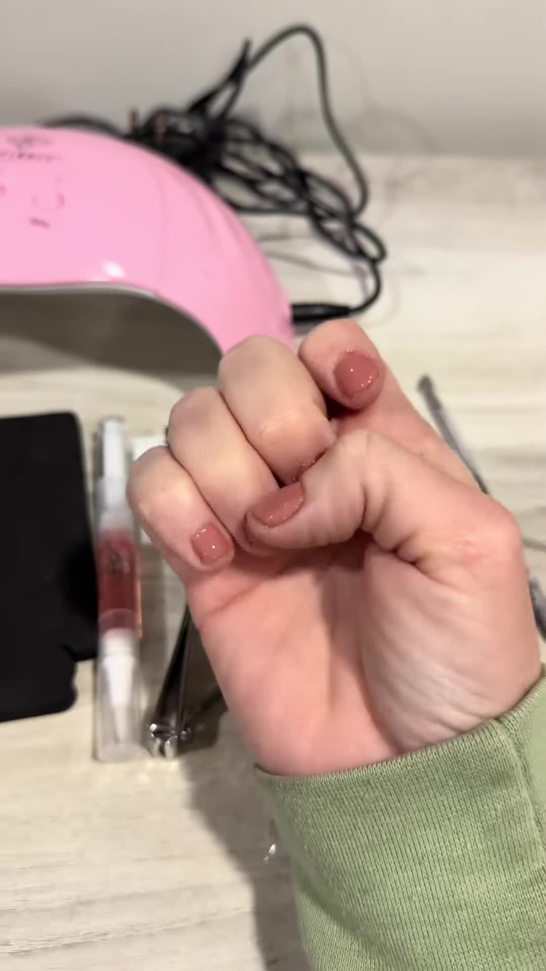 A shot showing the finished, polished nails.