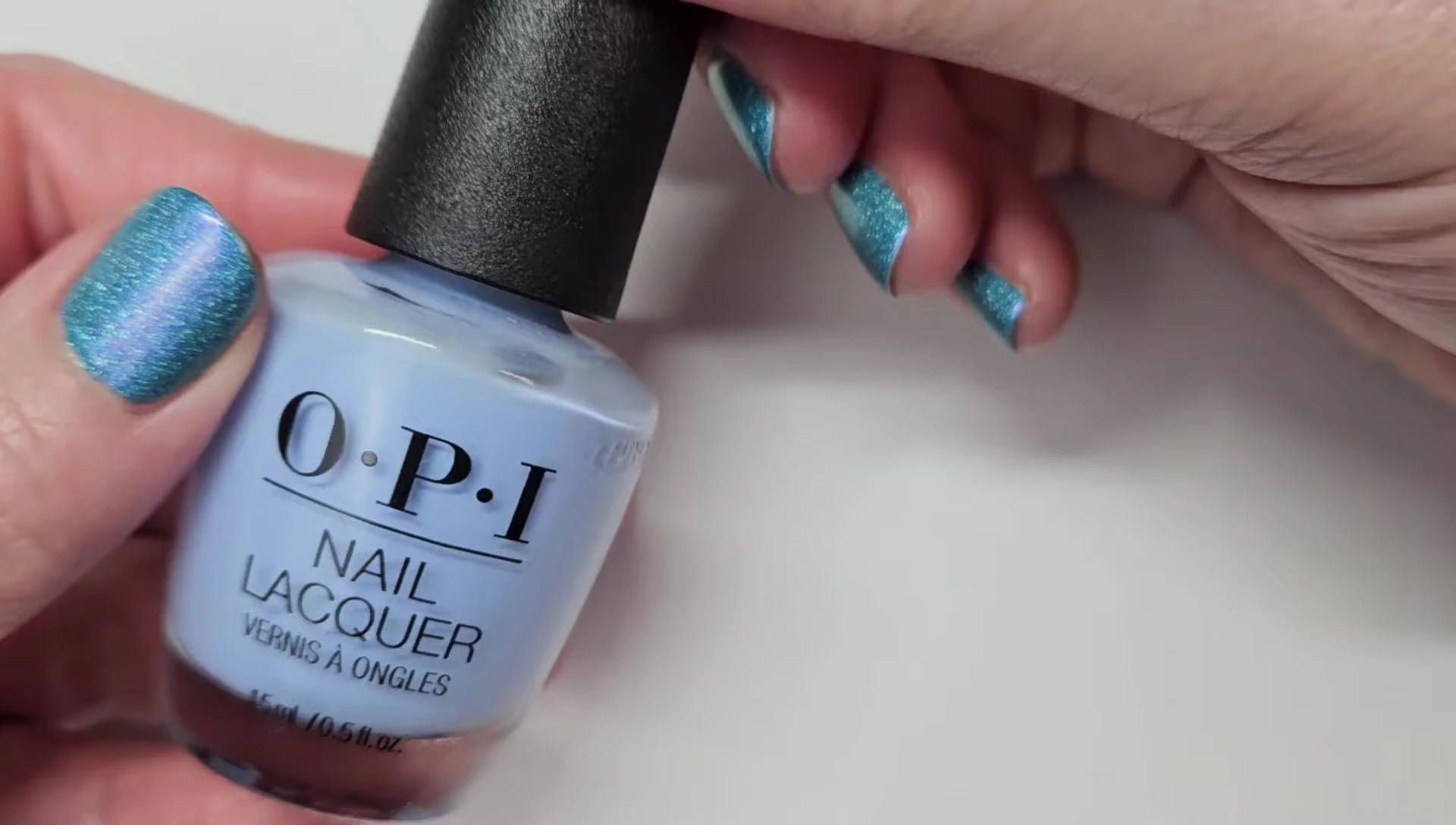 Bottle shot of OPI Verified nail polish.