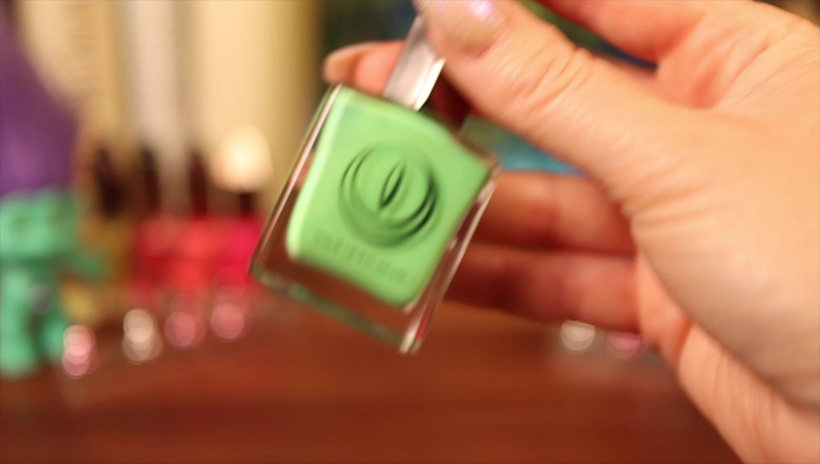 Swatch of Ribbit, a pastel green with subtle blue shimmer.
