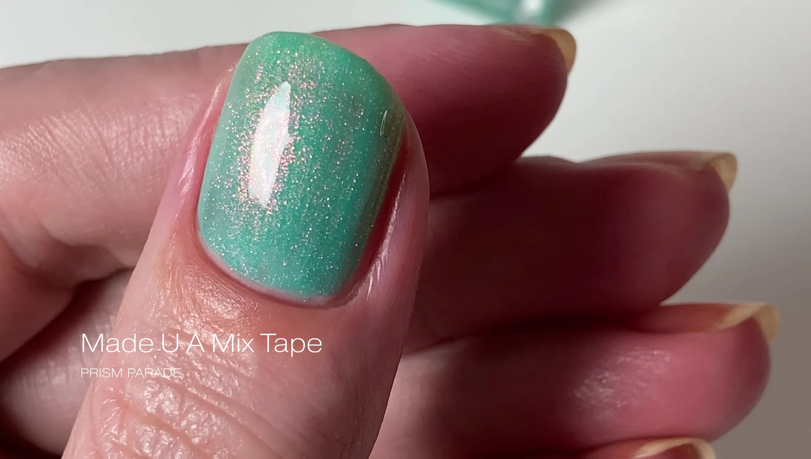 Made You a Mixtape polish demonstrating the color shift of the shimmer.