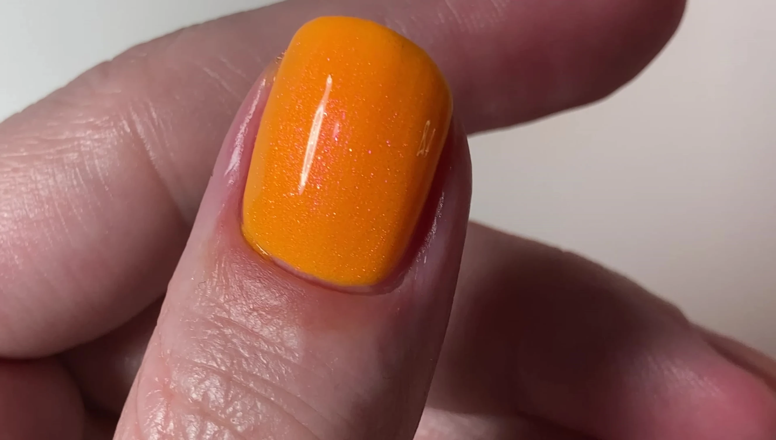 Two Straws and One Julius nail polish, demonstrating the shimmer shift.