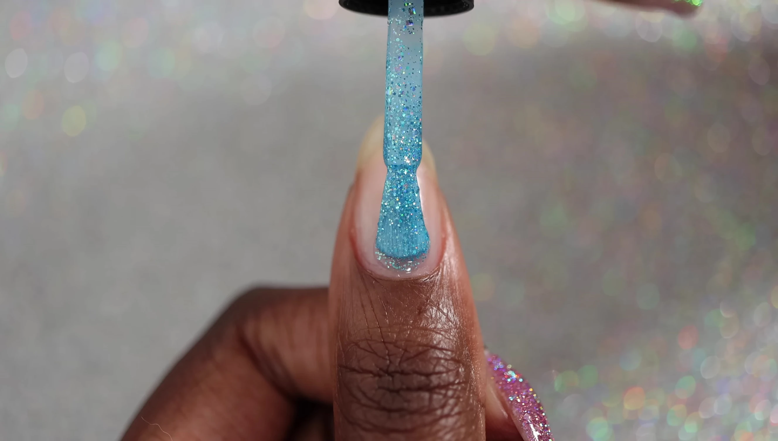 Close-up shot of Eight Bit Blues nail polish