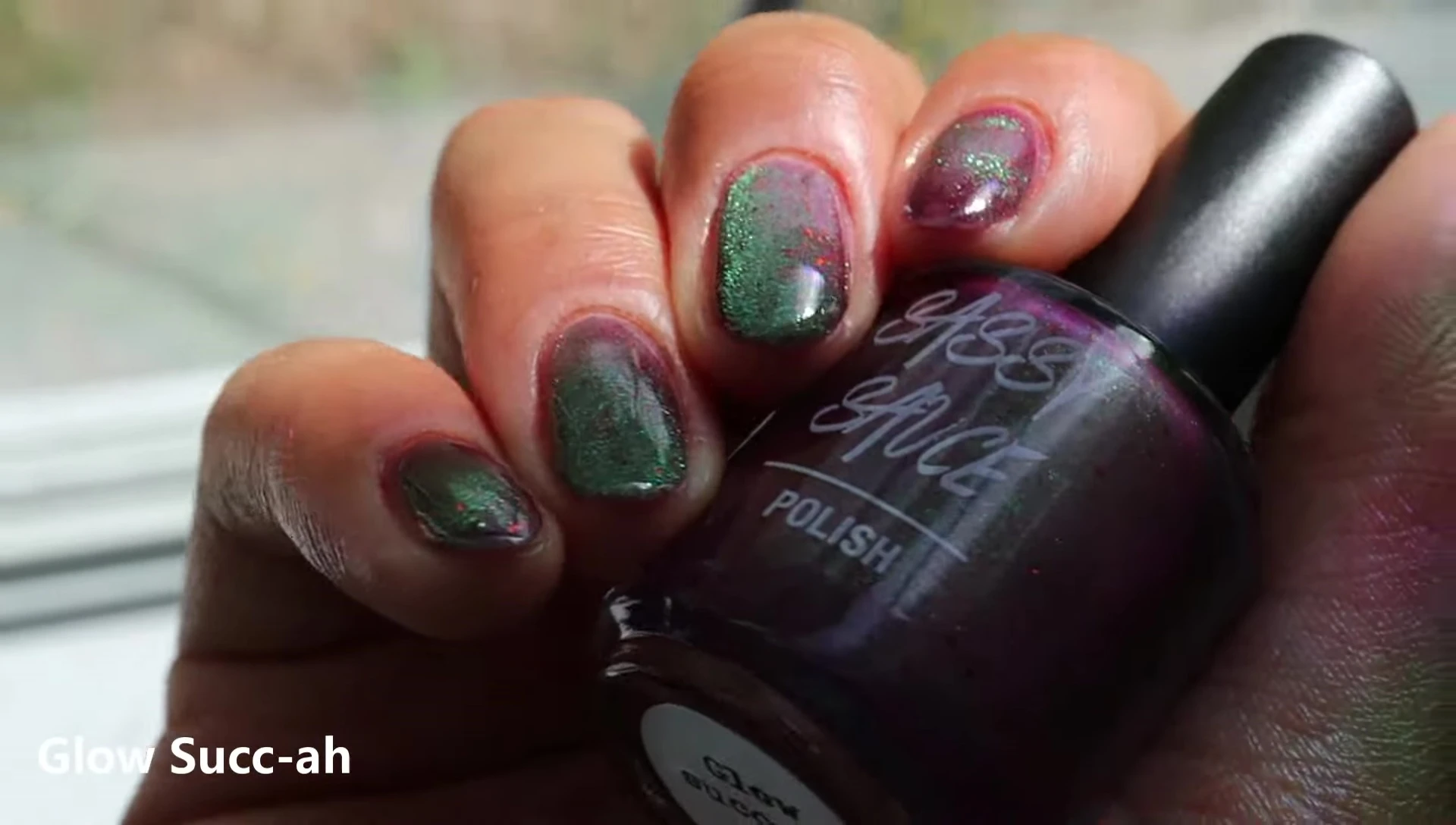 Swatches of Glow Sucka nail polish showcasing different magnetic effects