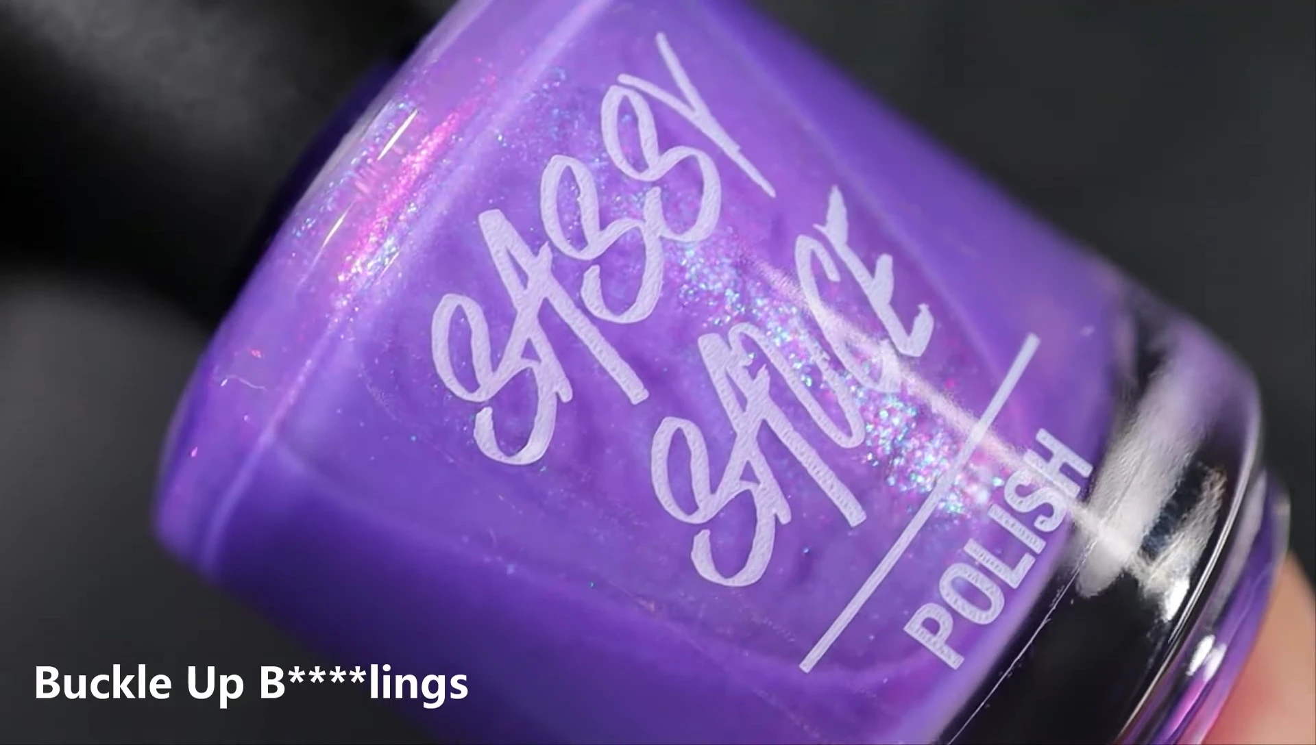 Close-up shot of Buckle Up nail polish bottle