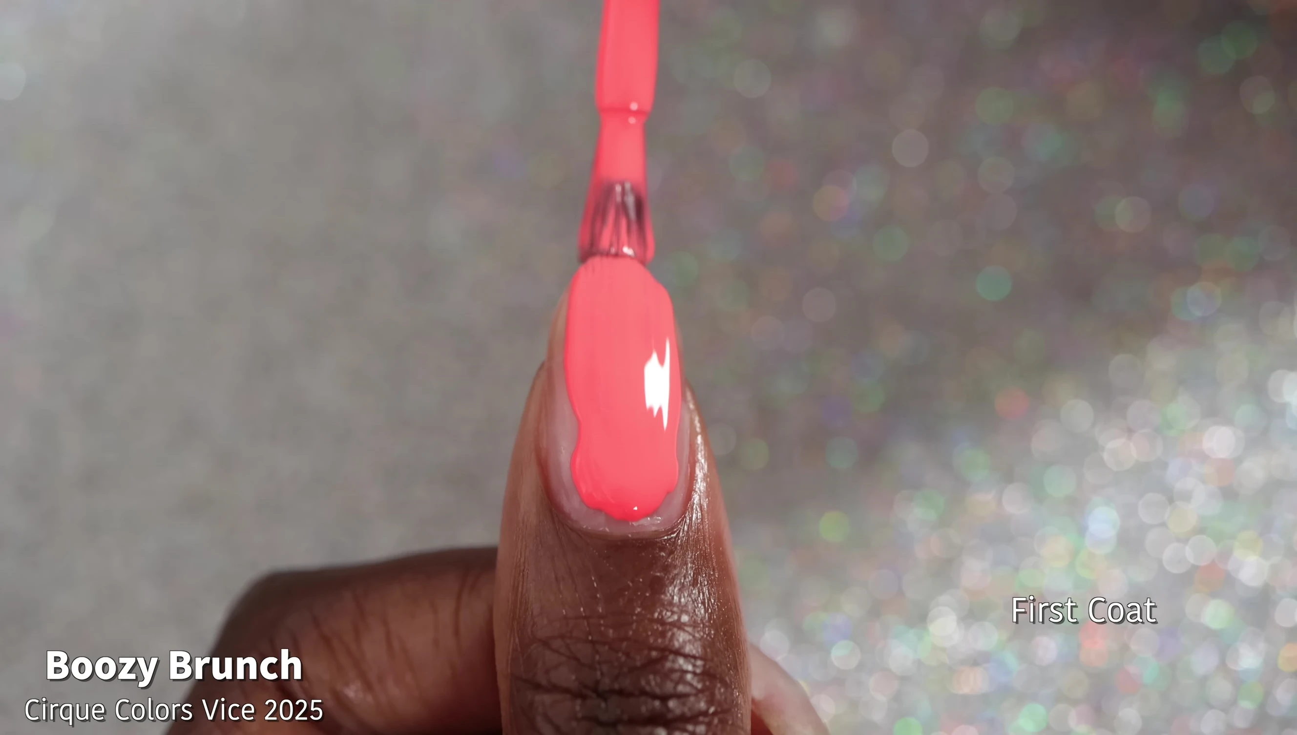 Close-up shot of Boozy Brunch nail polish on nails