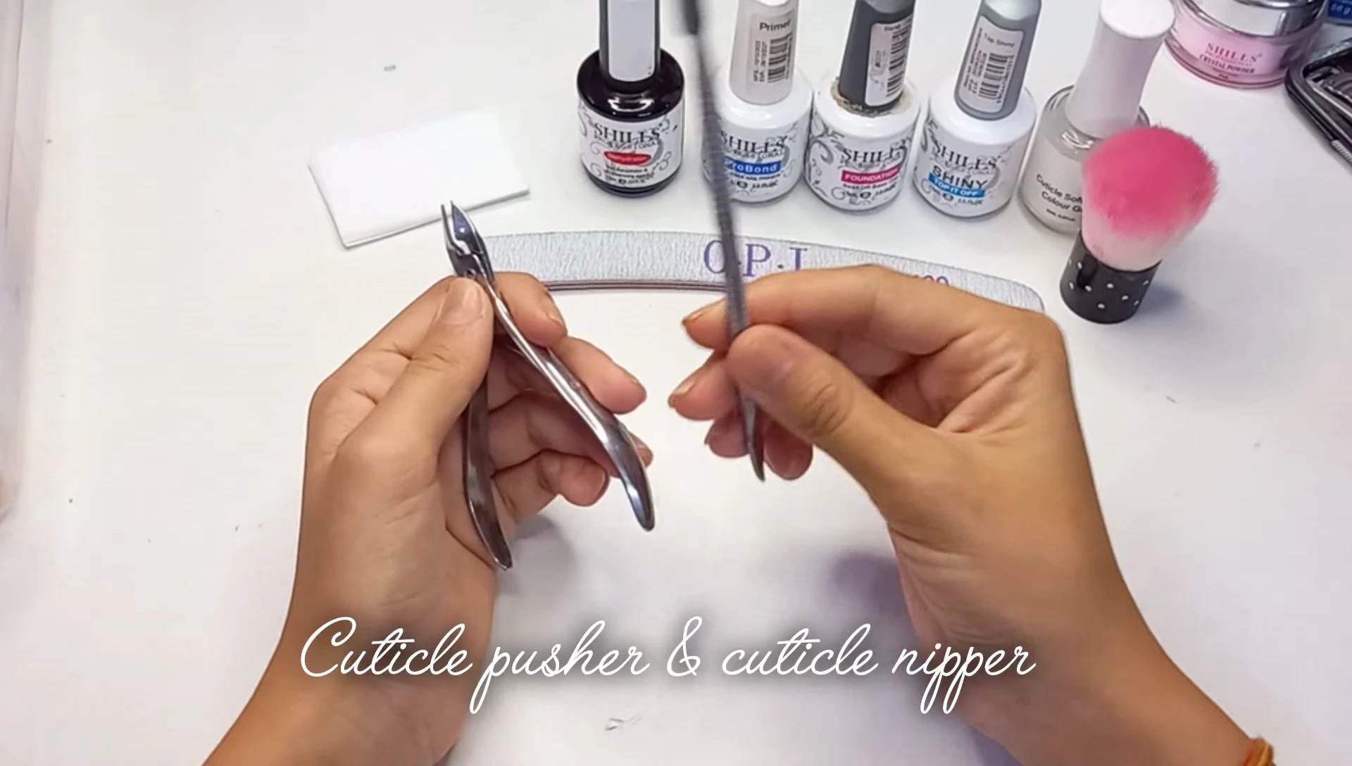 Cuticle pusher and nipper