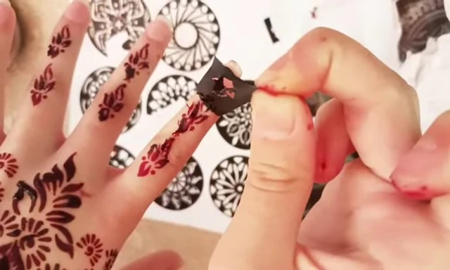 Close-up shot showcasing the finished mehndi design.