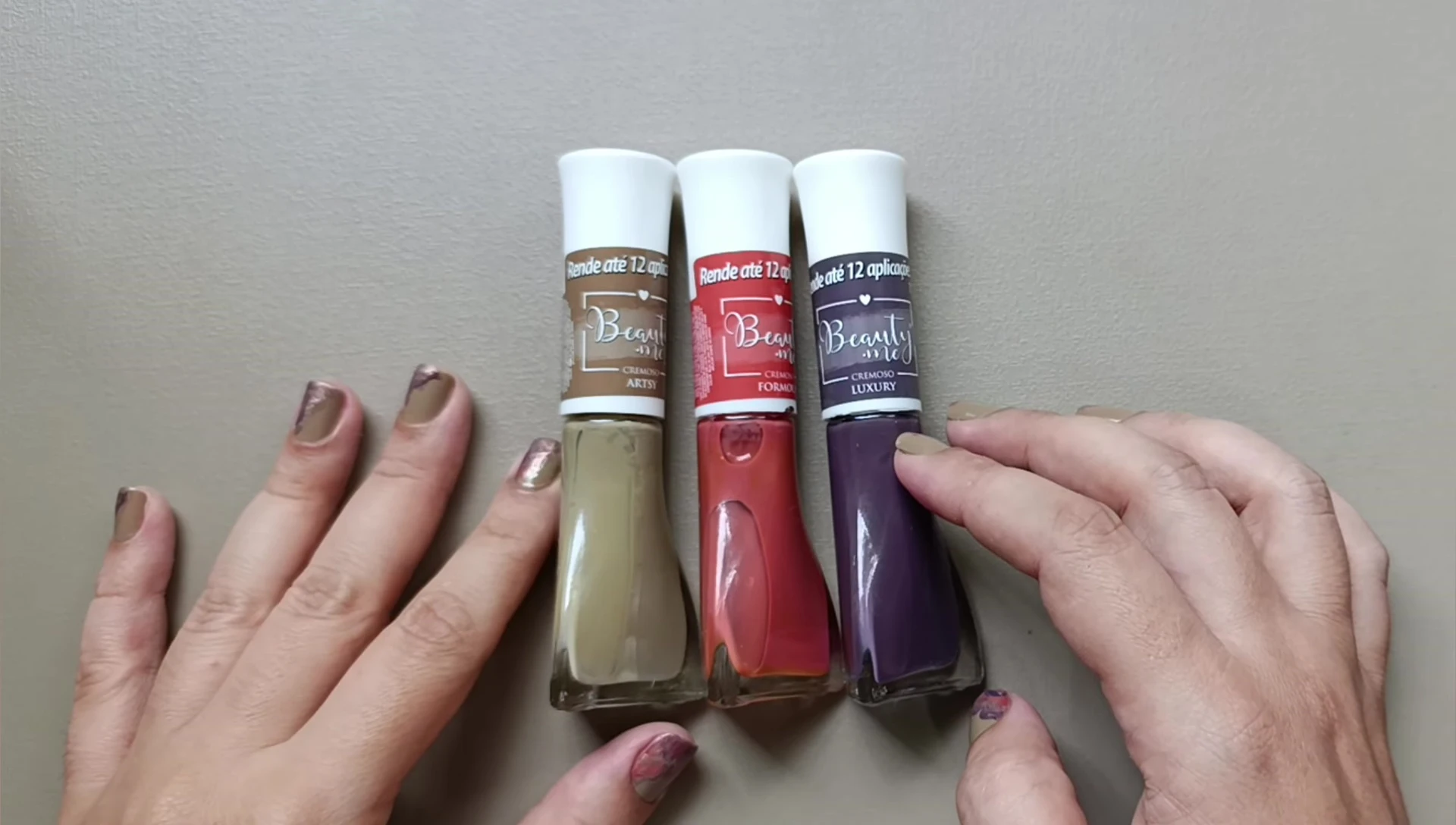 Screenshot of nails with nail polish applied with base and top coat
