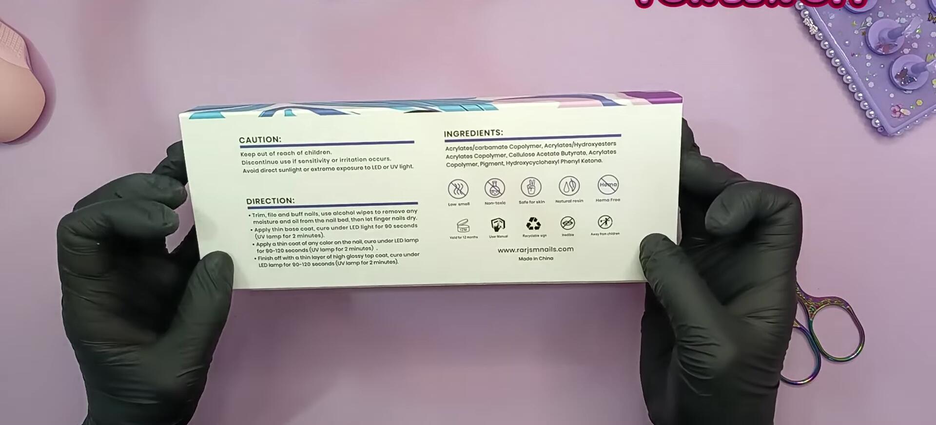 Close-up of the RARJSM gel polish box with six bottles inside