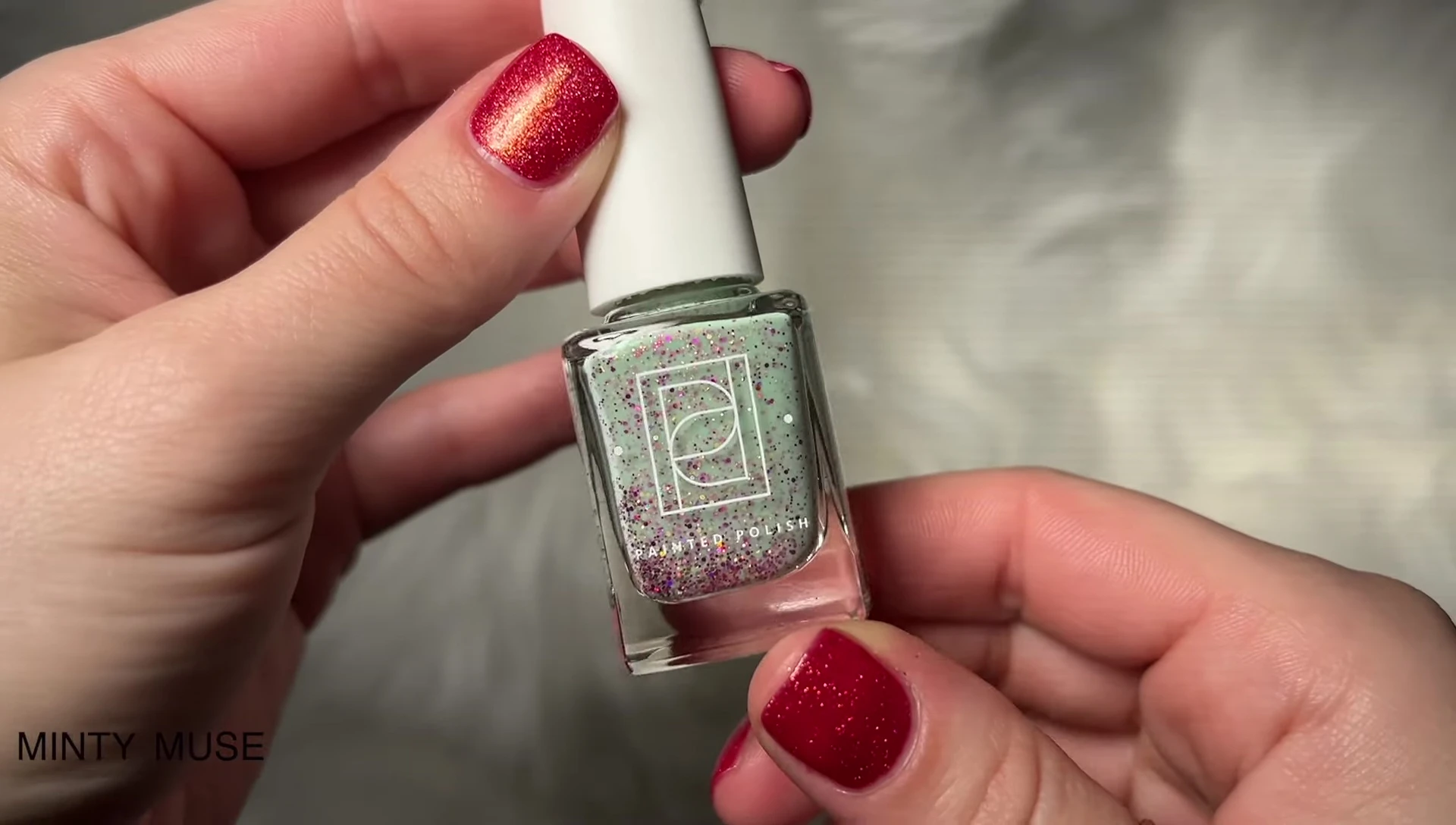 Minty Muse swatches demonstrating the mix of pink, fuchsia, and gold glitters and flakes.
