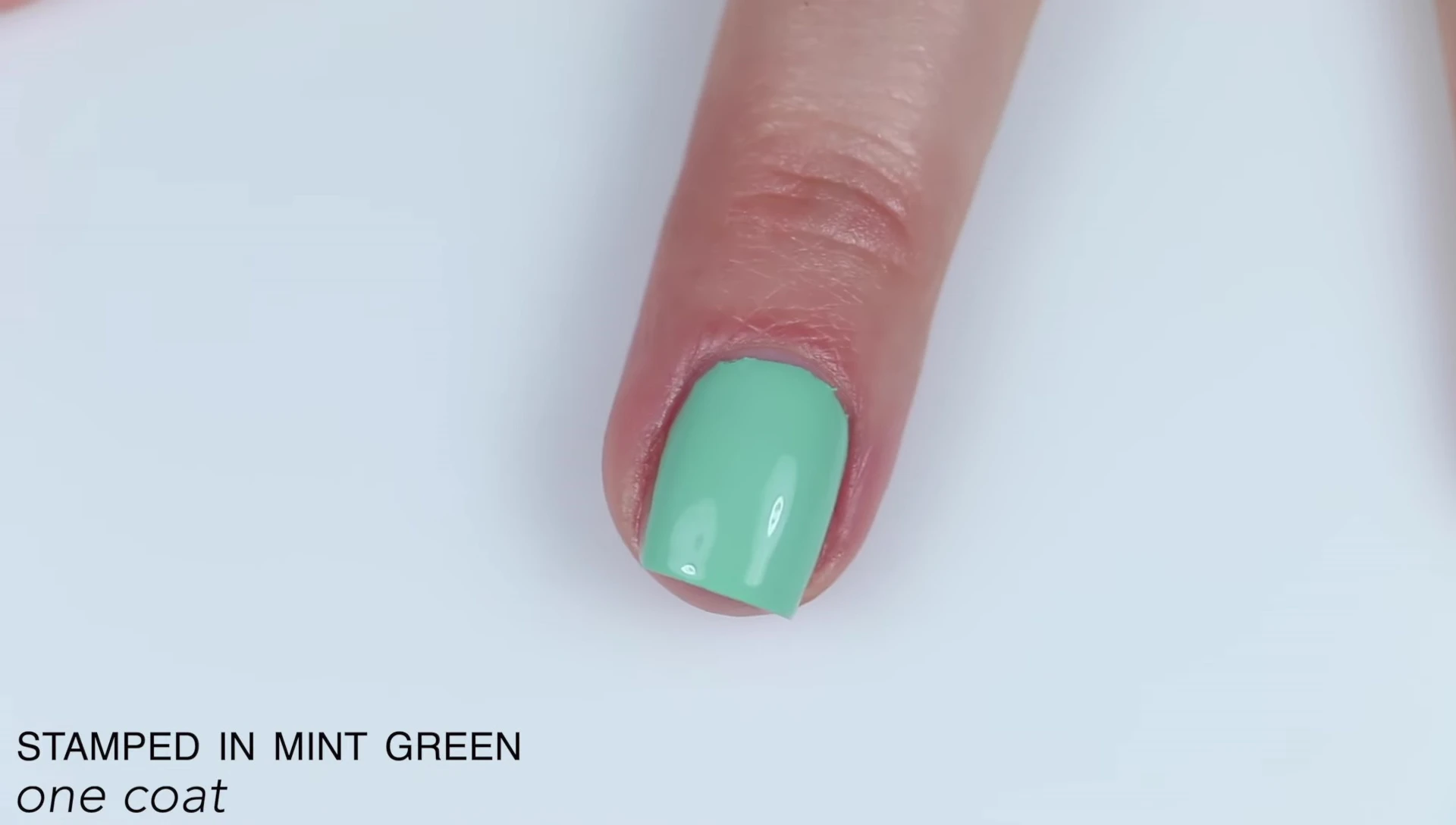 Close-up shot showcasing the self-leveling and streak-free application of Stamped in Mint Green