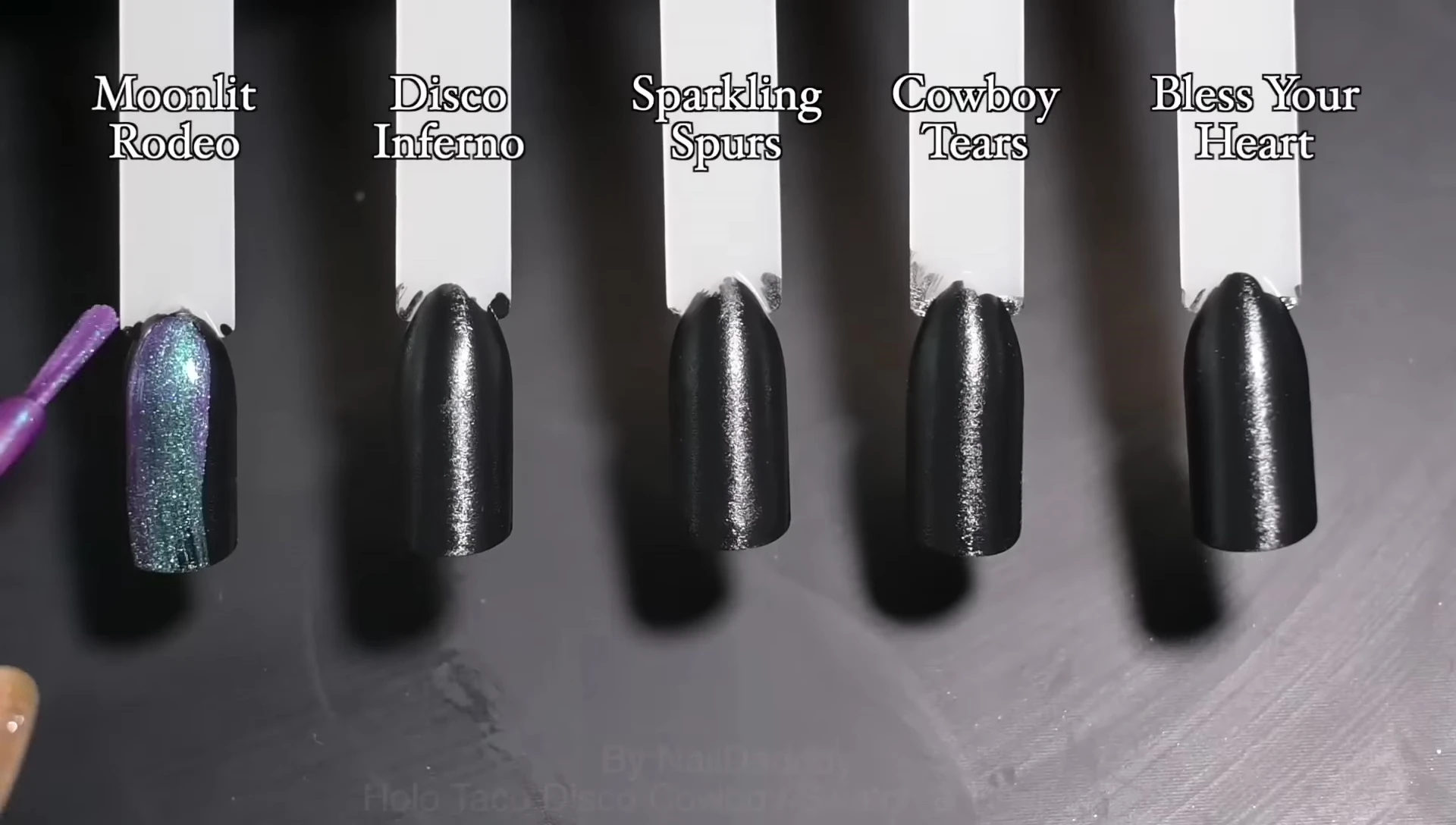 Swatches of the polishes over black.