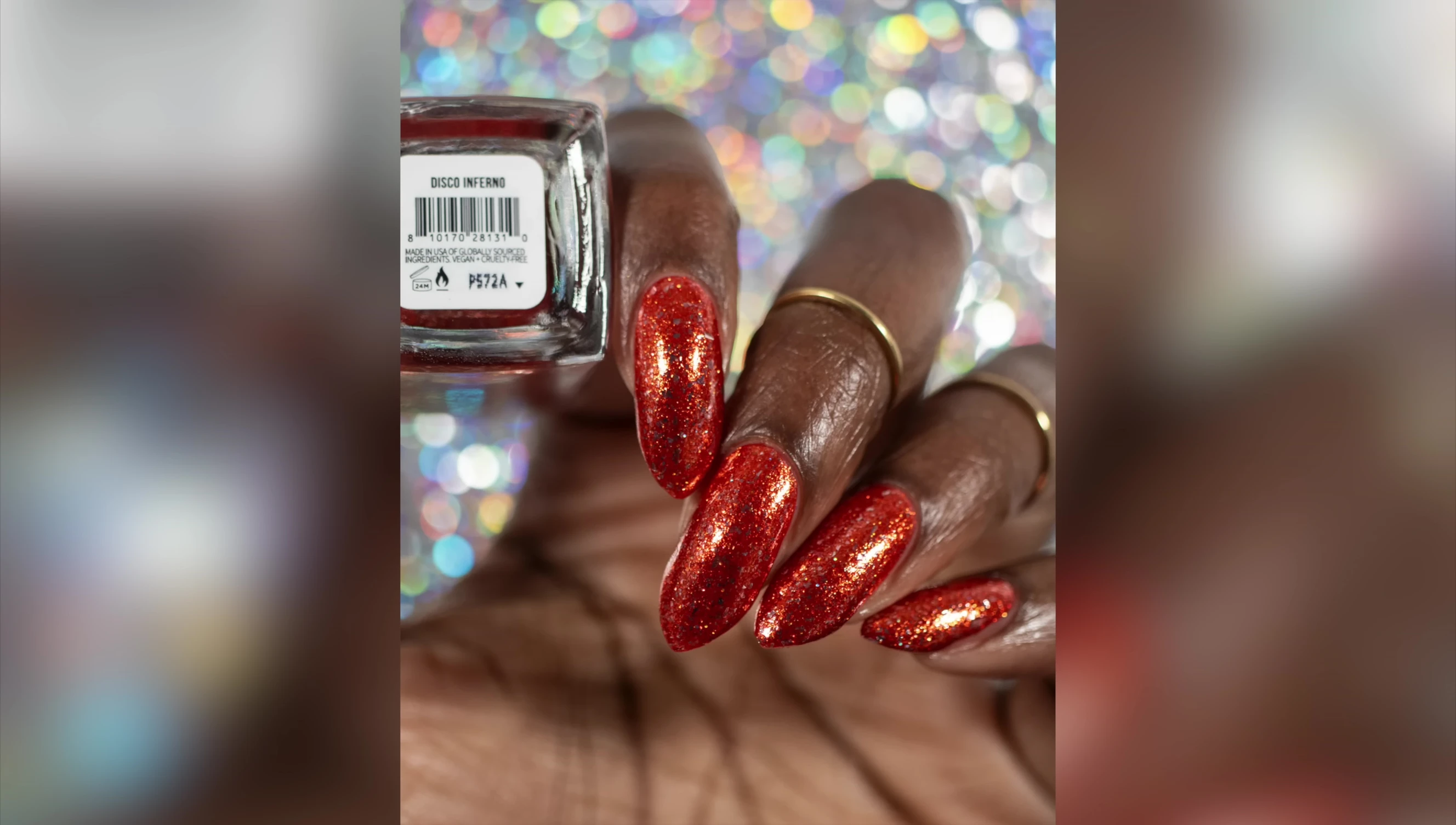 Full hand swatch of Disco Inferno in three coats with top coat.
