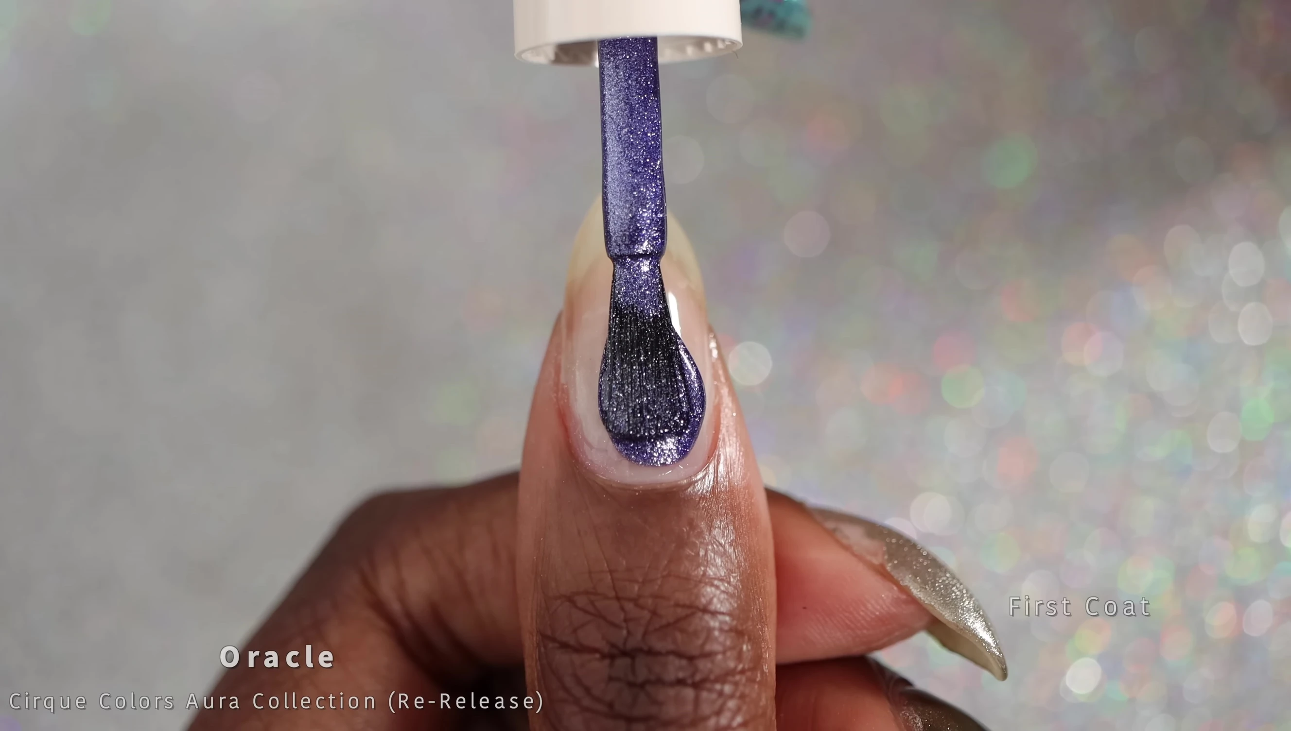 Close-up of Oracle nail polish bottle and swatch.