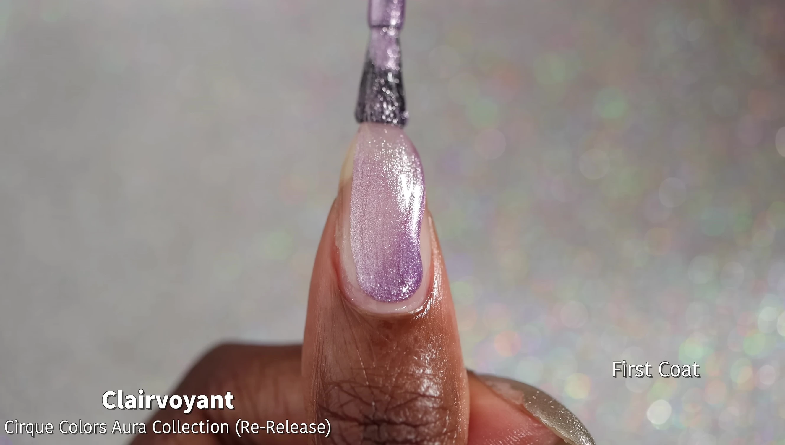 Close-up of Clairvoyant nail polish bottle and swatch.