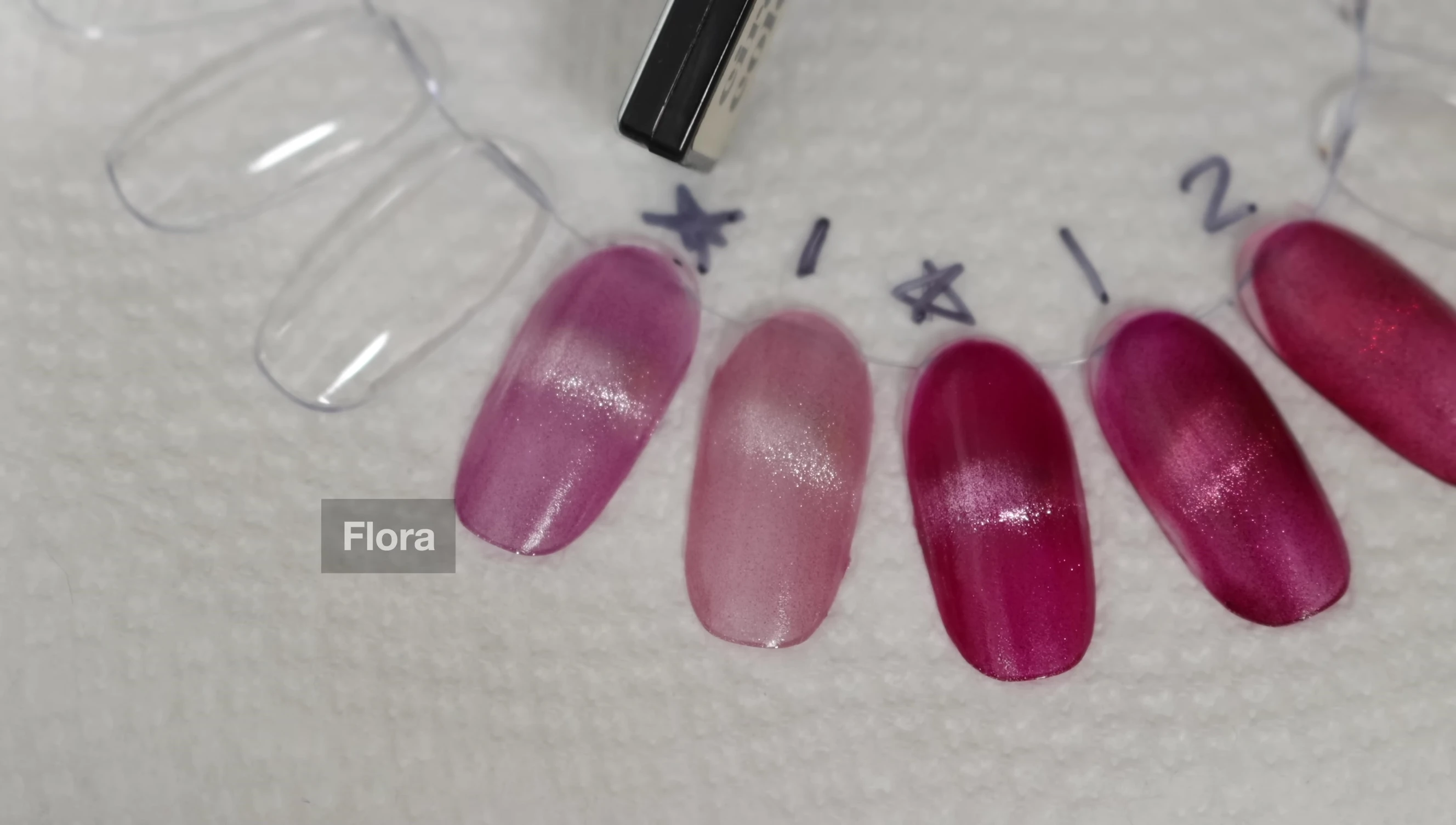 Comparison swatches of Flora and Bay.