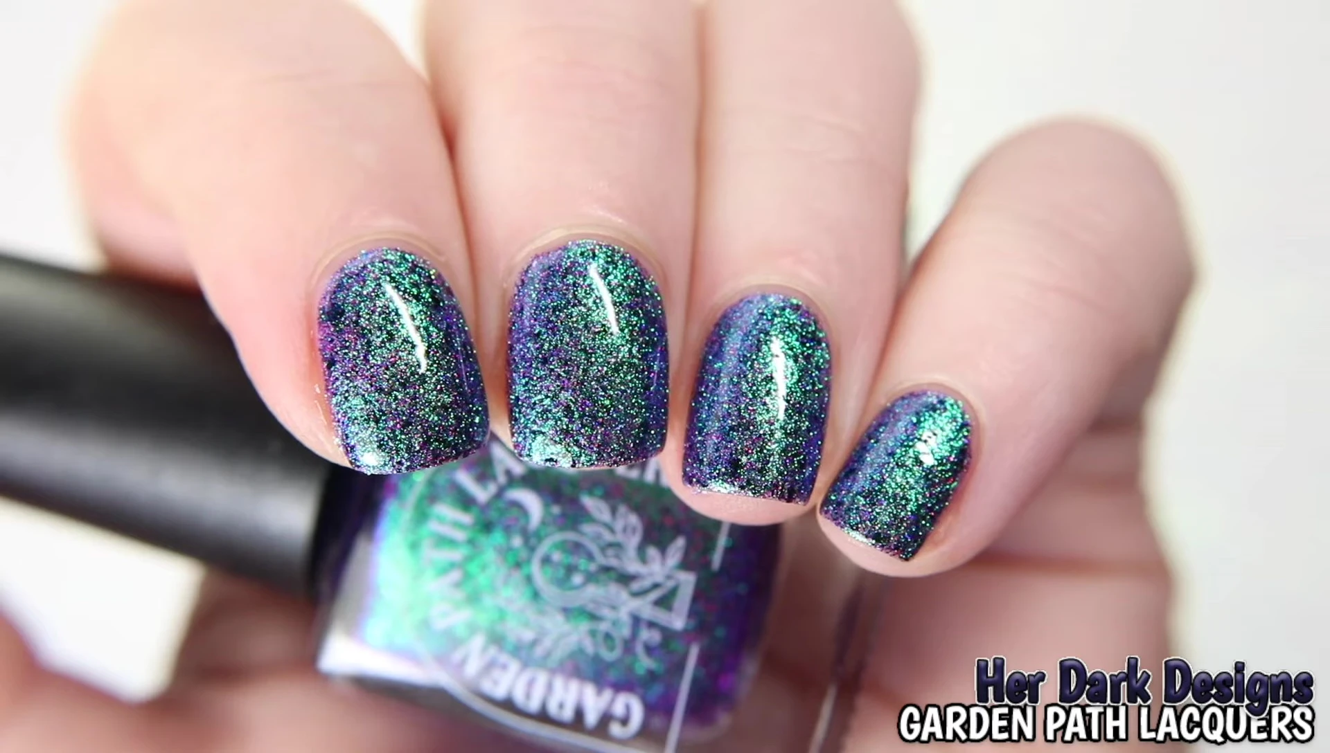 Garden Path Lacquers Her Dark Designs under low lighting