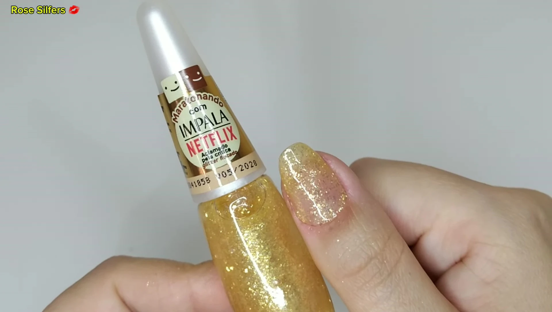 Nails with two coats of Critical Acclaim glitter
