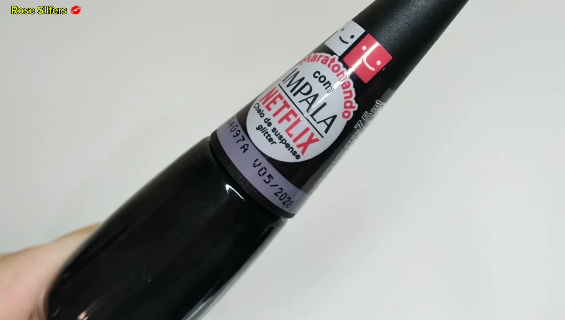 Suspenseful nail polish bottle