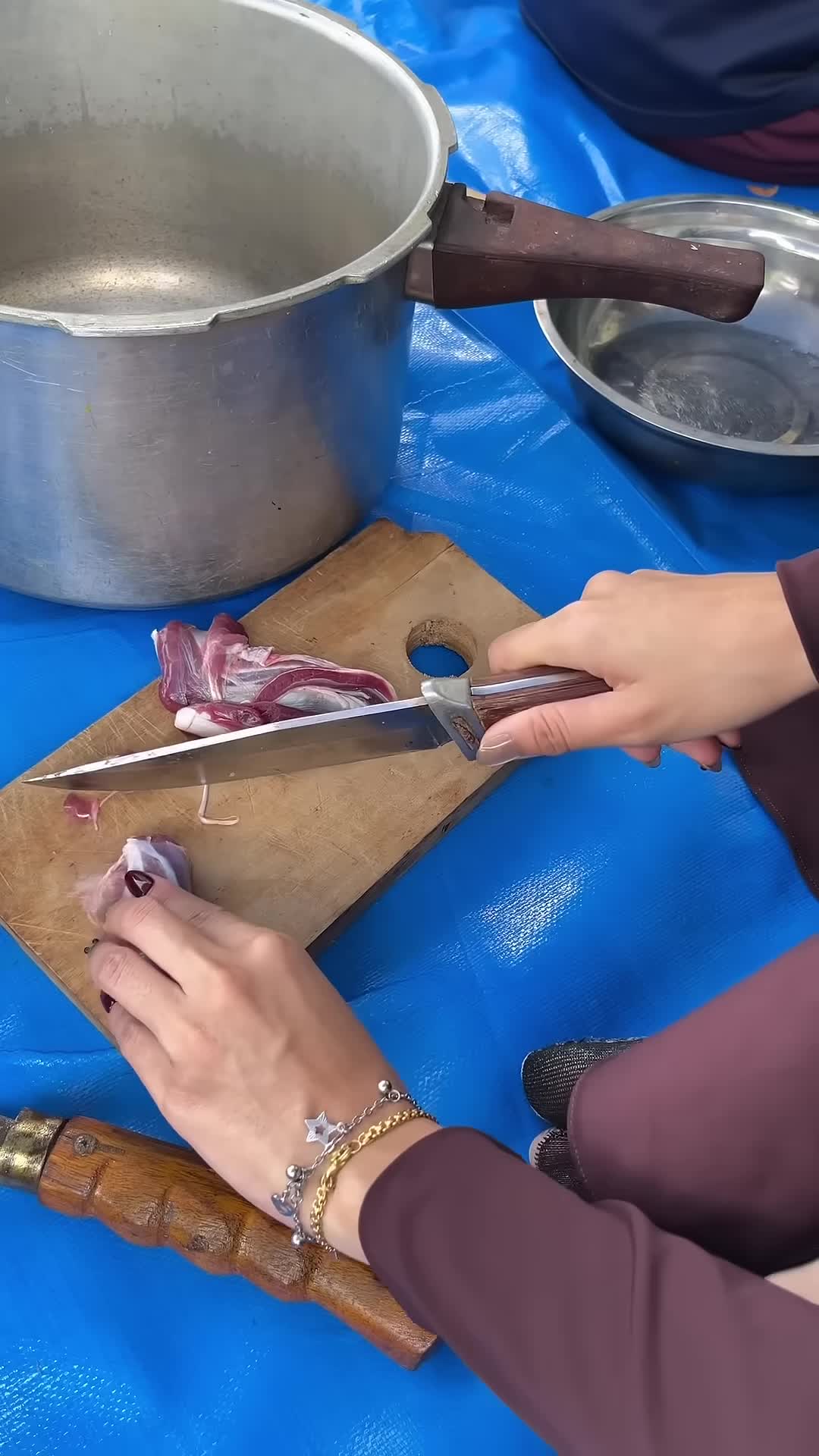The reviewer using fake nail glue to cut meat