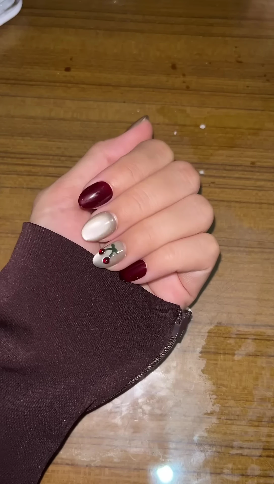 The reviewer showing the completed nail application