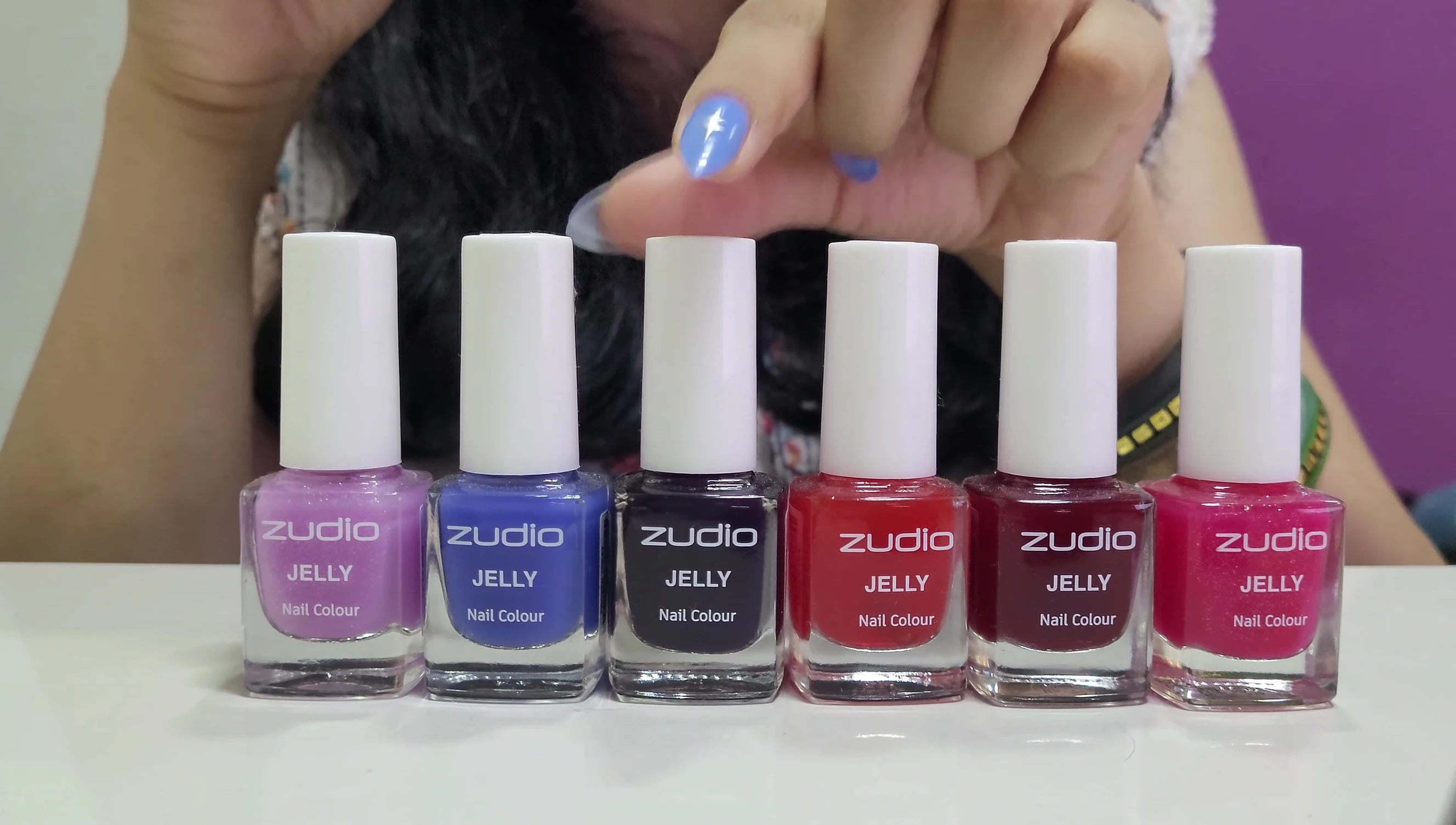Swatch of the purple jelly nail polish.