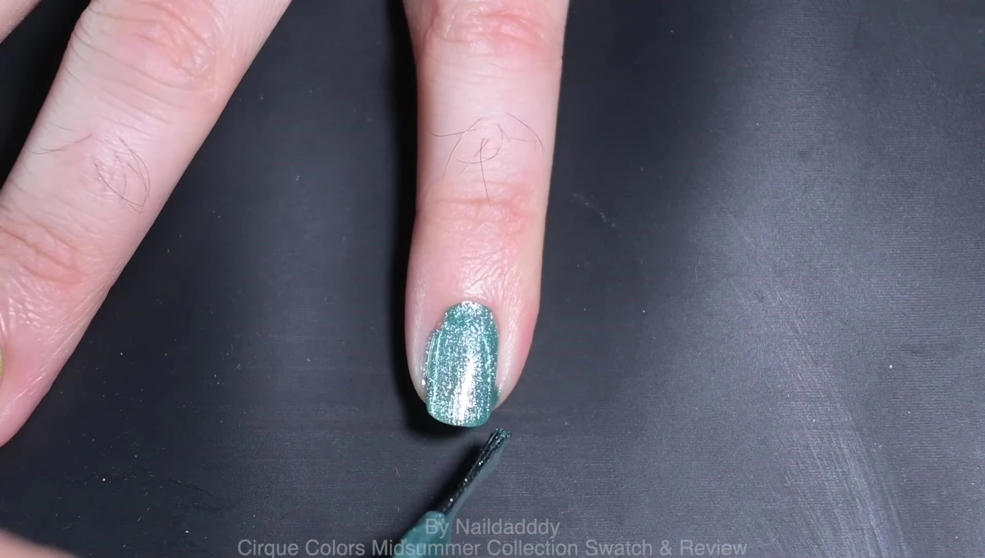 Close-up shot of Vdor swatch on a nail.
