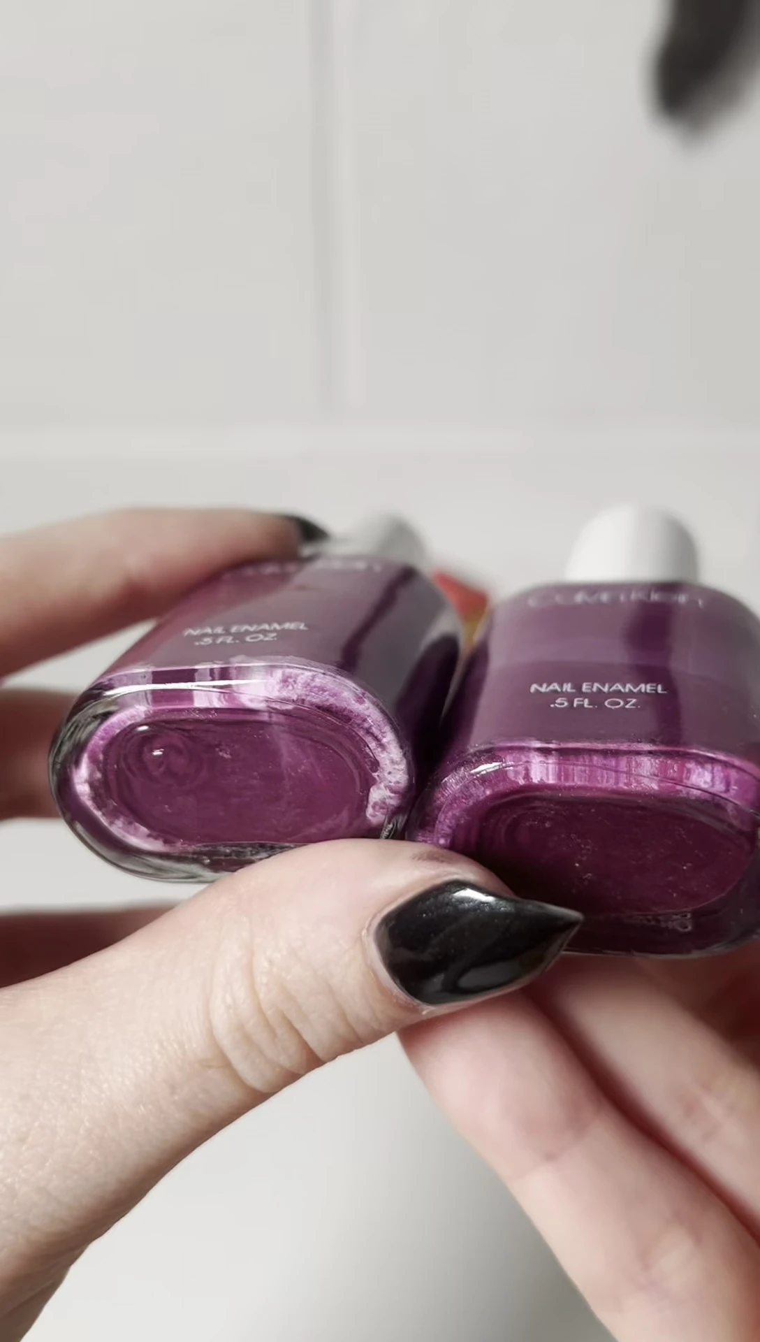 The Calvin Klein raspberry nail polish bottle