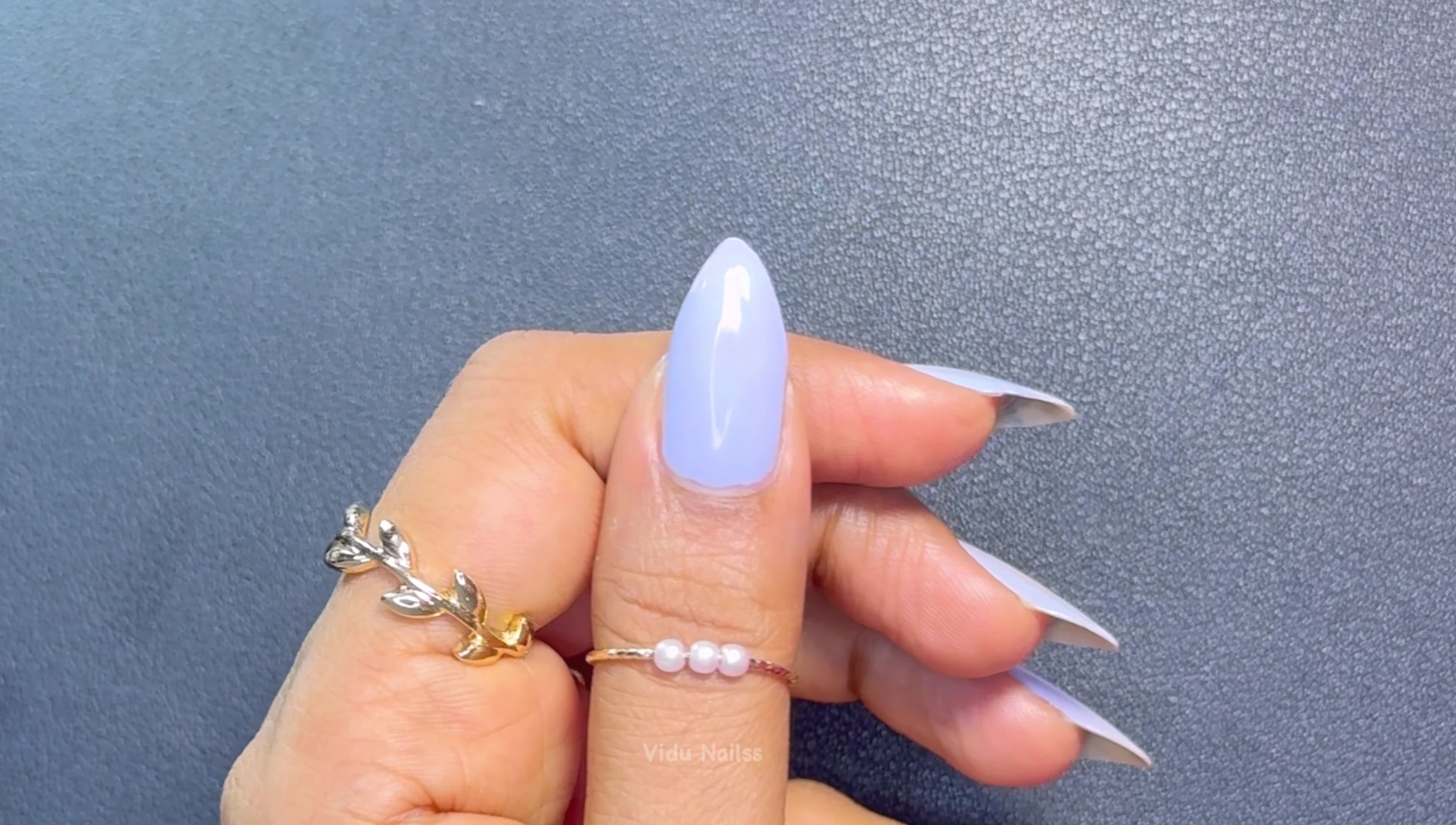 Close-up shot of Space pastel blue nail polish with purple undertones