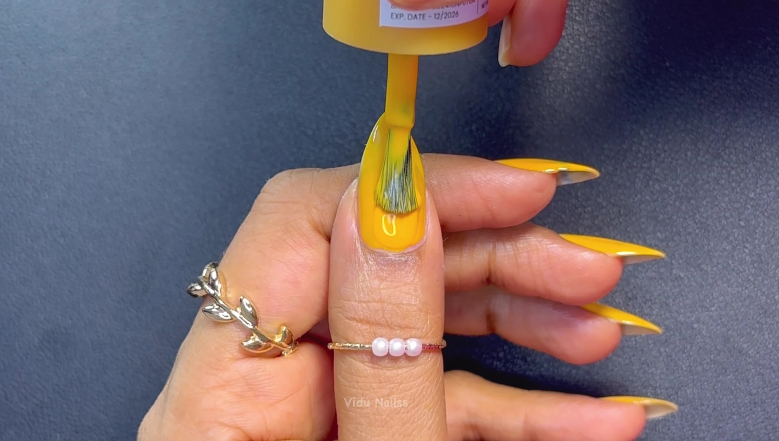Close-up shot of Ray yellow nail polish