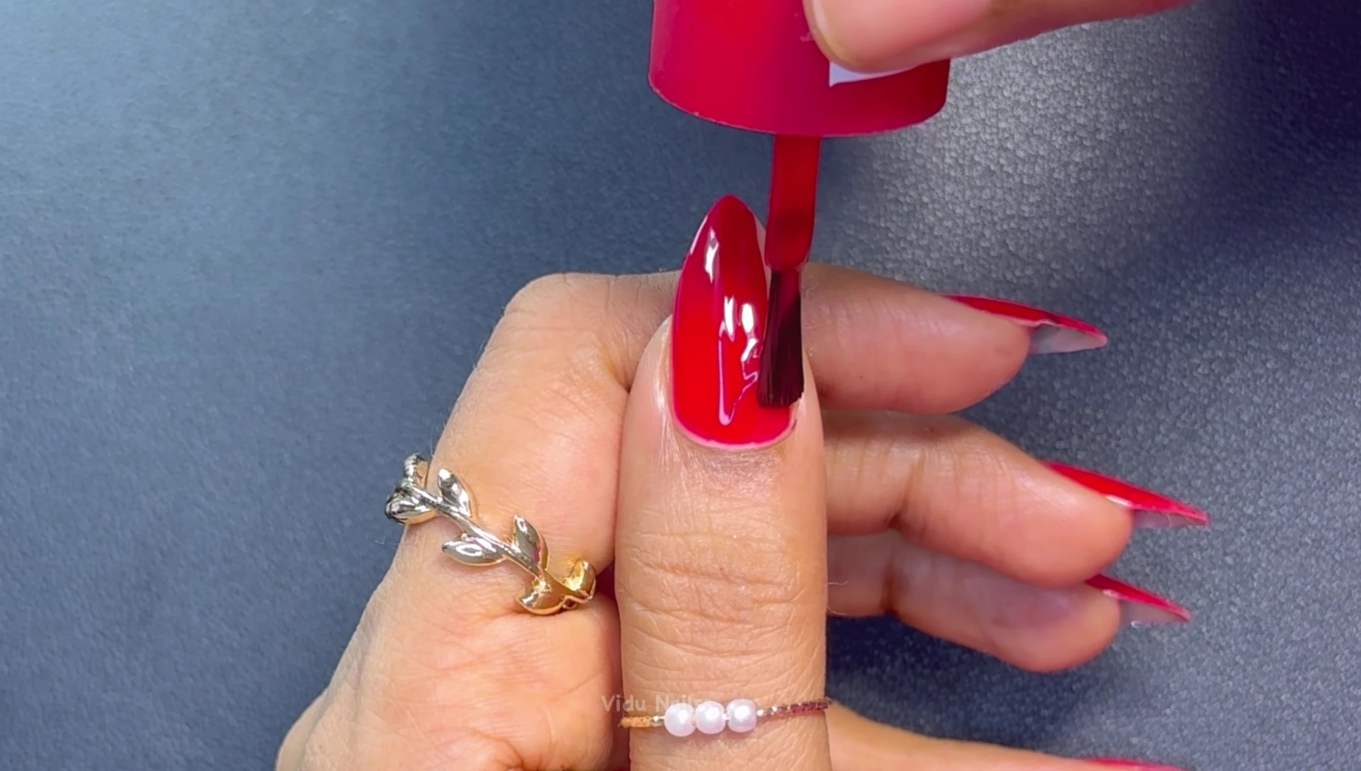 Close-up shot of Draco Red nail polish