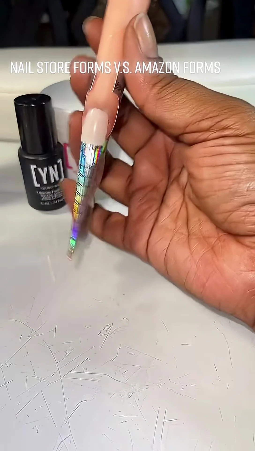 The Amazon nail form securely adhered to the nail, showing superior adhesion and stability.