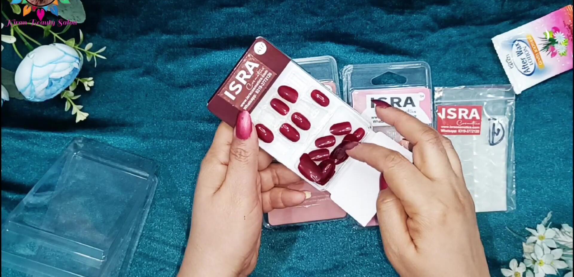Kiran showing the Isra Cosmetics nails