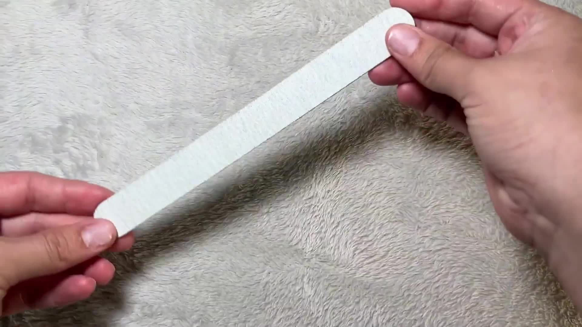 The nail file and applicator included in the kit