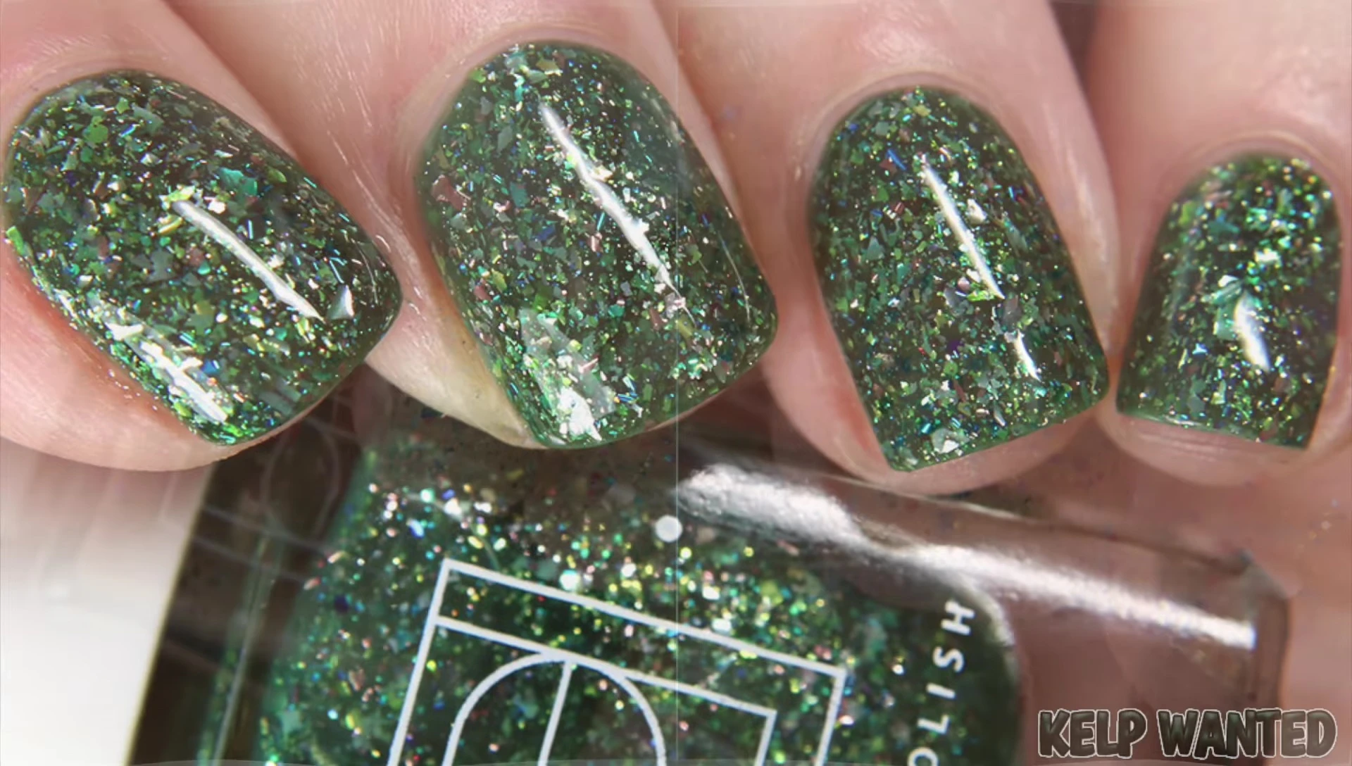 Close-up shot of Kelp Wanted nail polish bottle