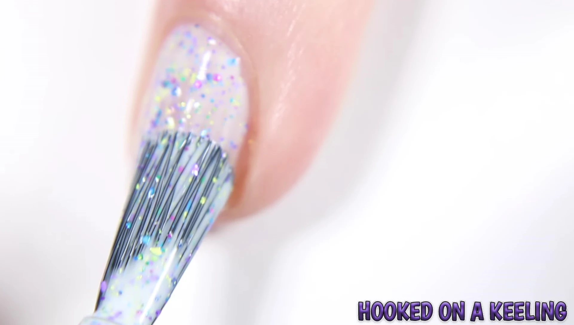 Swatches of Hooked on a Kaling nail polish under different lighting conditions