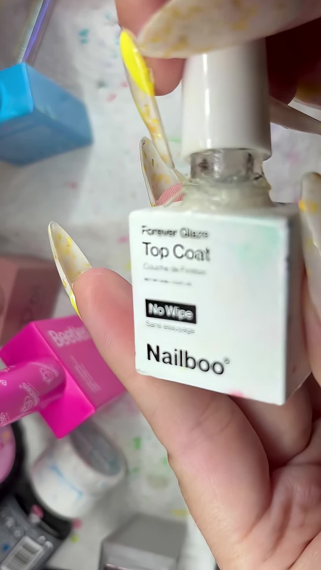 Initial view of the Nailboo Top Coat bottle.