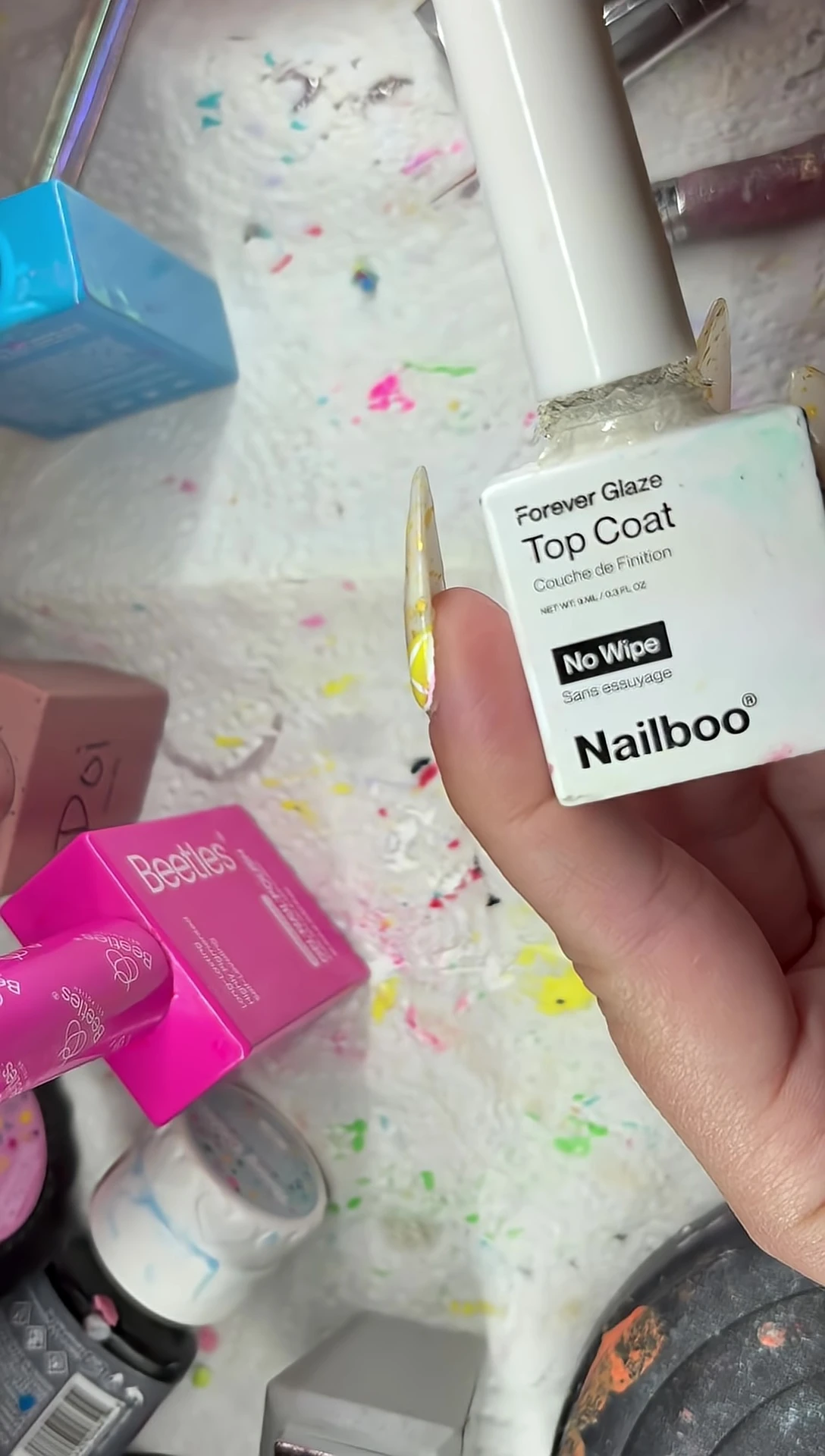 Close up showing the thin consistency of the top coat.